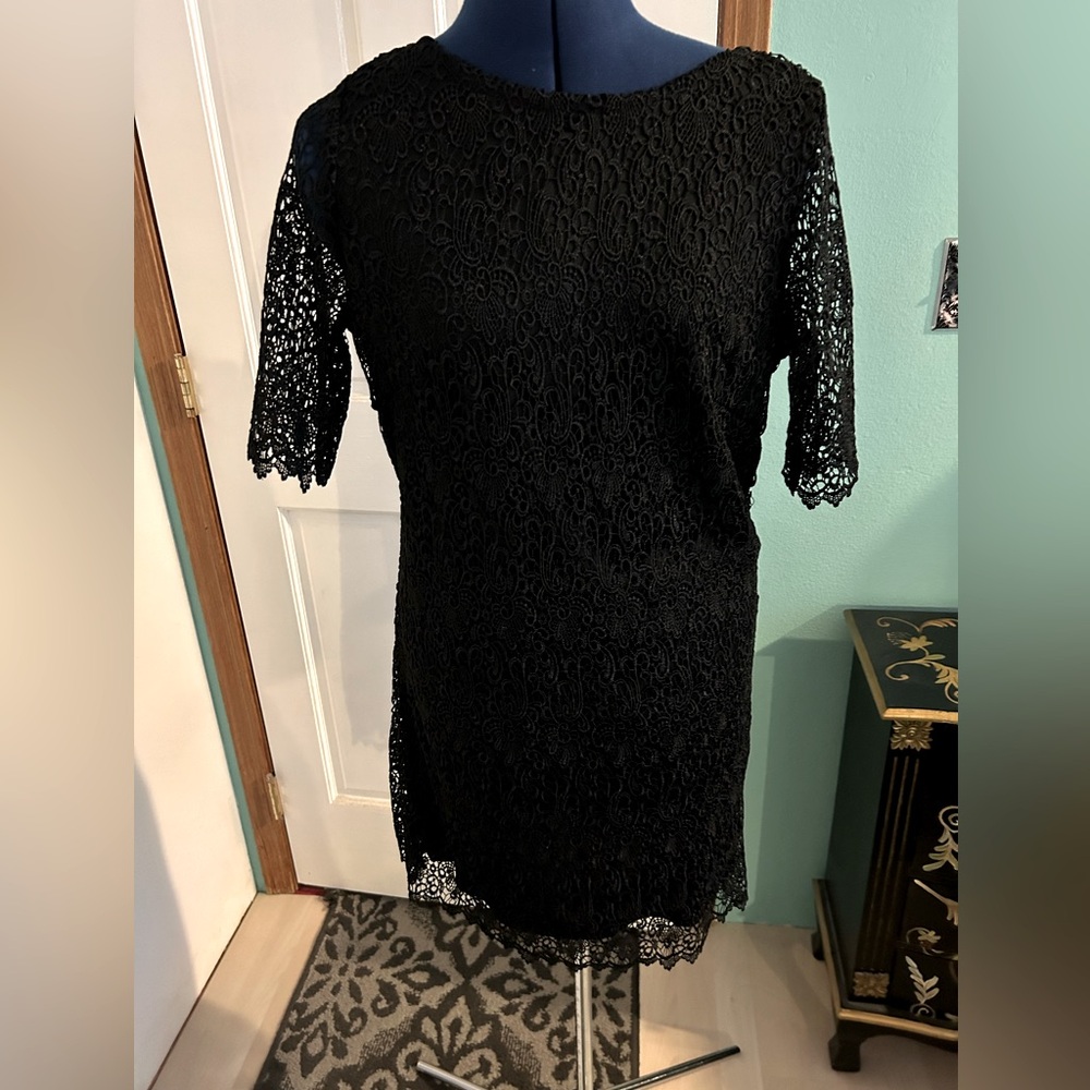 Black lace dress no tags or size but it fits me size 8.